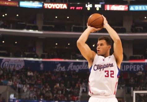 Blake_Griffin_in_white_Clipper_home_jersey_rises_for_a_jumper_at_Staples_Center